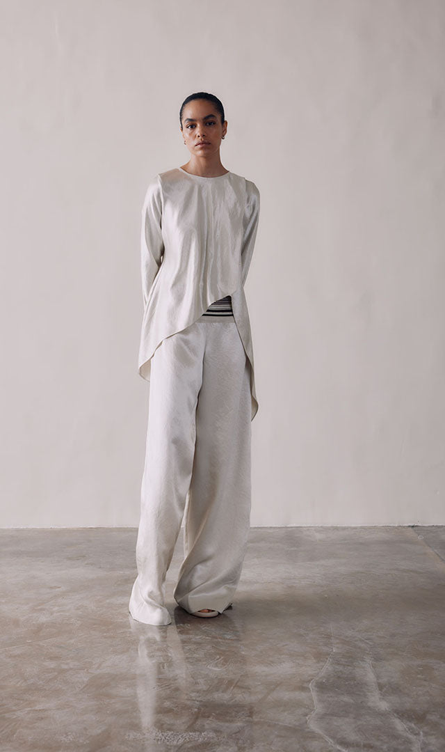 Naia Asymmetric Top